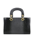 Leather Chroma Craft handbag with strap.
